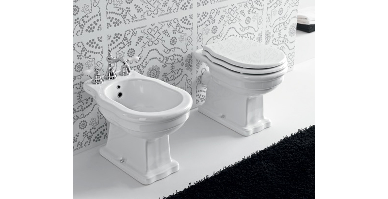 Sanitary ware with shaped (carved) toilet seat covers